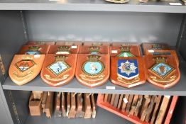 A quantity of military shield wall plaques, to include HMS Victory, HMS Daedalus, Sors Varia Opus