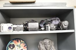 A quantity of vintage cameras and cases, to include a Polaroid camera, Fujifilm MX-600ZOOM and a