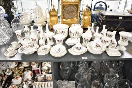 A quantity of Wedgwood 'Hathaway' pattern pottery wares, to include vases, urns, candlesticks,