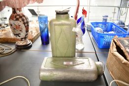 A pair of green metal military type canteen bottles having screw tops, h26cm