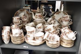 A Royal Albert 'Colclough' pattern fine bone china dinner service, decorated with floral patterns on