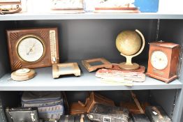 A mid-century world globe, h20cm, sold together with a barometer, clock and bar magnets ect, (8)