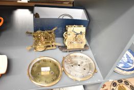 An early 20th century brass clock dial, w15.5cm, sold together with another clock face, 2