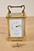 A Morrell & Hilton, Huntingdon brass carriage clock with key, h11.5cm