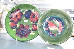 A Moorcroft pottery 'Anemone' pattern plate, having impressed and painted marks to base, w26cm, sold