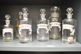 An early 20th century glass chemists/ pharmacy bottle with stopper named Gum Camphor, h24cm, sold