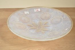 A large French Lalique style opalescent glass bowl in the Art Deco style having moulded foliage