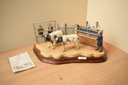 A limited edition Border Fine Arts figure group 'Under The Hammer Belgian Blue Cross' model number