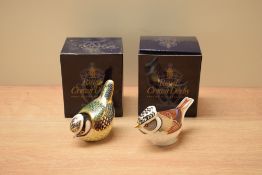 A Royal Crown Derby bone china collectors guild exclusive 'Crested Tit' paperweight sold alongside a
