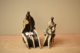 After Stefan Gorski (1932-2008) a pair of studio pottery figures, one depicting a couple the other
