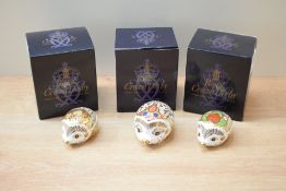 A Royal Crown Derby bone china 'Bramble Hedgehog' paperweight sold alongside two Royal Crown Derby