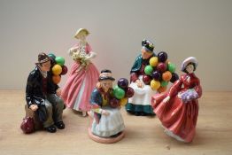 A group of four Royal Doulton bone china figures/figurines comprising 'The Old Balloon Seller' HN