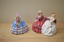 A Royal Doulton bone china figure group 'The Gossips' HN 2025 sold together with a Royal Doulton