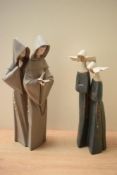A pair of Lladro porcelain figure groups comprising 'Monks at Prayer' model number 5155 in grey matt