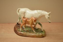 A Royal Doulton bone china figure group 'The Gude Grey Mare' HN 2532 designed by W.M. Chance.