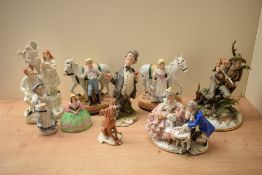 A large group of Capodimonte and similar porcelain figures and figurines including a Hunter, The