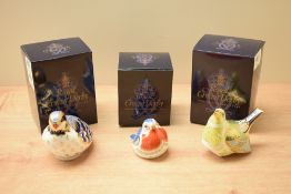 A group of three Royal Crown Derby bone china paperweights comprising Greenfinch, Red-Legged