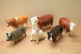 A group of six Beswick pottery animal studies comprising Hereford Cow model number 1360 in brown and