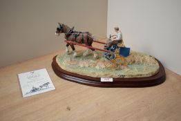 A limited edition Border Fine Arts figure group 'Rowing Up' model number B0598, designed by Ray