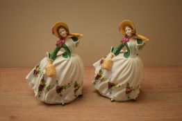 Two Royal Albert bone china figurines both 'Rose' model number RA 22, measuring 18cm.