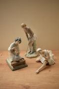 A group of three Lladro porcelain figurines comprising 'Ballett Purple' model number 1356 with