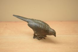 A small cast patinated spelter pheasant study, bears a Chinese marking to underside.