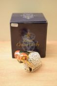 A Royal Crown Derby bone china visitors centre exclusive 'Derby Ram' paperweight, having Imari style