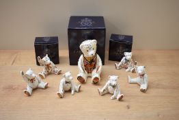A Royal Crown Derby bone china collectors guild exclusive 'Debonair Bear' paperweight with silver