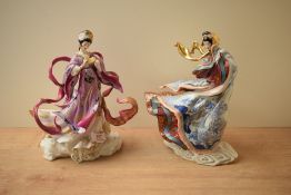 A pair of Franklin Mint porcelain oriental figurines comprising 'Empress of the Snow' model number M