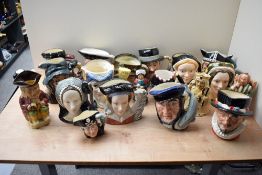 A large group of Royal Doulton Toby Jugs including The Star Crossed Lovers Collection double sided