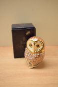 A Royal Crown Derby bone china 'Barn Owl' paperweight, having Imari style decoration and silver