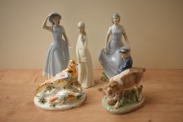 A Royal Copenhagen porcelain figure group 'Boy and Calf' model number 772 having signature to