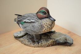 A hand carved and painted Teal study by Mike Wood, having date 'Feb 2003' and signature to