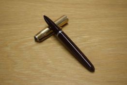 A Parker 51 Demi vacumatic fill fountain pen in Maroon with a Gold Filled cap. (some rub to cap)