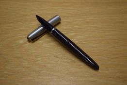 A Parker 51 aerometric fill fountain pen in Plum with lustraloy cap with gold trim