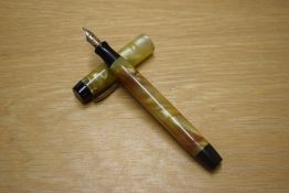 A Parker Victory button fill fountain pen in pale Green and Gold swirl with bandless cap having