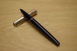 A Parker 51 aerometric fill fountain pen in Black with Rolled Gold cap