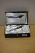 A boxed Conway Stewart 100 twist fill fountain pen in Peppered White No383/036 with a wide and two