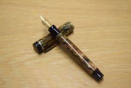A Parker Duofold Junior button fill fountain pen in Black and Pearl with three narrow cap bands