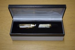 A boxed Sigma converter fill fountain pen in White Coconut having Iridium Point Germany nib