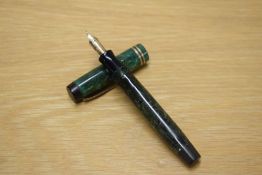 A Parker Duofold button fill fountain pen in Jade Green with two narrow cap bands having Parker