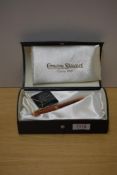 A boxed Conway Stewart Ebonite 58 conveter fill fountain pen in Red Ripple with one wide and two