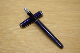 A Parker Sonnet converter fill fountain pen in Laque Dark Blue with silver trim having Parker 18K