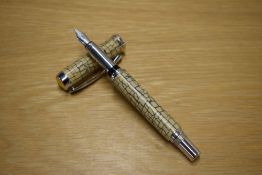 A Sigma converter fill fountain pen in Cream having Iridium Point Germany nib