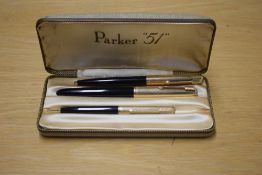 A boxed Parker 51 aerometric fountain pen, propelling pencil and ballpoint pen in Black with