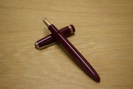 A Parker Duofold Maxima aerometric fill fountain pen in Burgundy with a wide decorative cap band