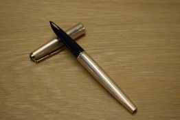 A Parker 61 converter fill fountain pen in gold plate.