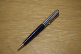 A Parker 17 Propelling pencil in Blue witha chrome cap with gold trim