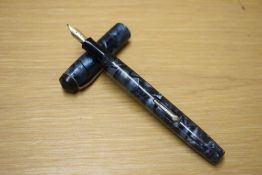 A Conway Stewart 479 lever fill fountain pen in Blue Marble with bandless cap having Conway