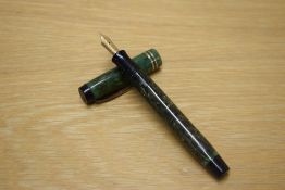 A Parker Duofold button fill fountain pen in Jade Green with two narrow cap bands having Parker